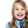 young school girl smiling with braces