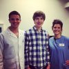 Boy at his final orthodontist visit for braces